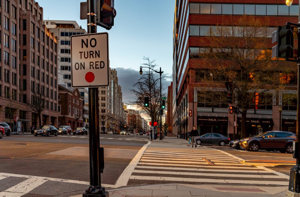 NJ 394–115 Improper turn at traffic light